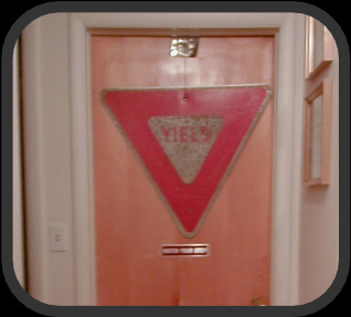 yield sign on a door